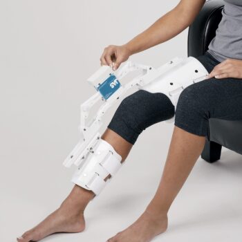 AS splint for joint therapy using static progressive stretch, unlike ERMI Knee Flexionater's high-intensity patient-actuated serial stretch